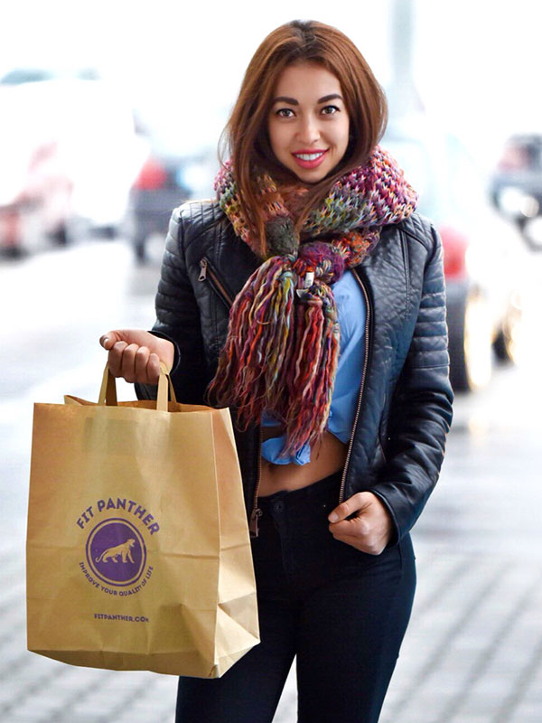 girl model with a pack of food from Fit Panther